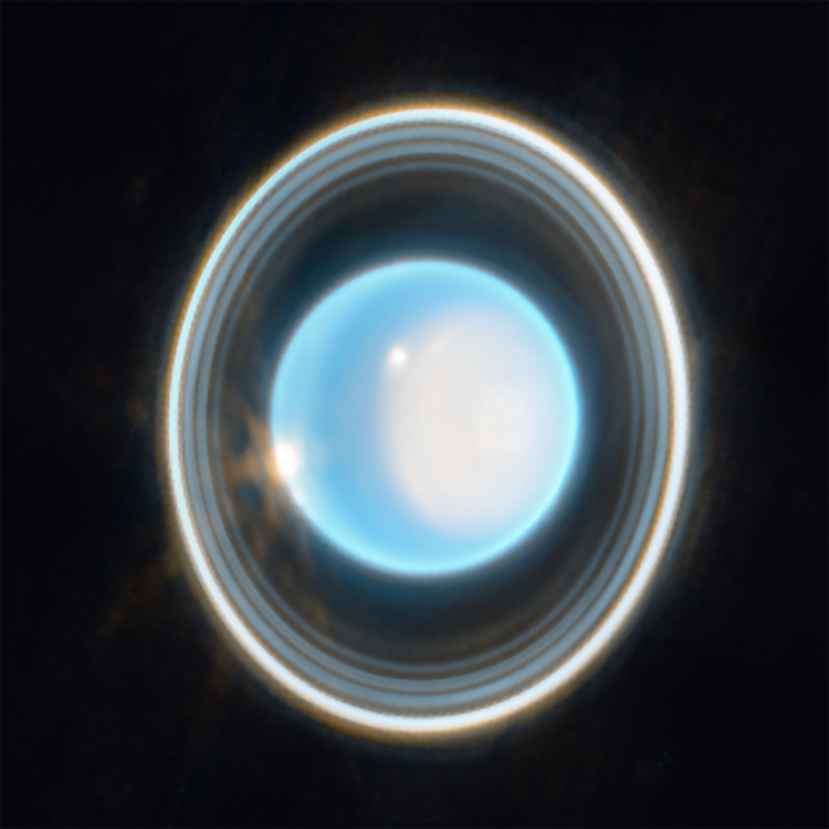 Zdjęcie Urana - błękitna kula otoczona pierścieniami 