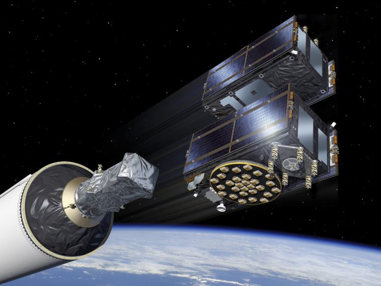 Ilustracja przedstawiająca satelity 29 i 30 oraz Falcon 9 na tle czarnago kosmosu. Ziemia jest widoczna w dolnej części obrazka.
